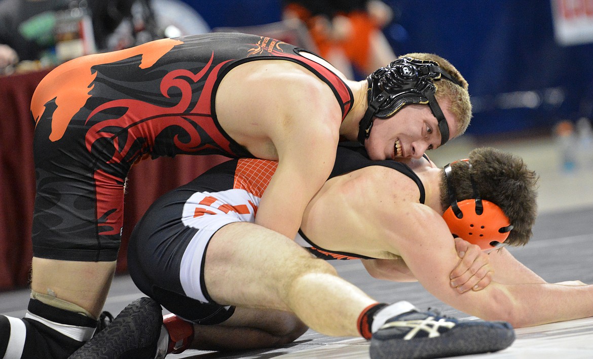 SAVAGE HORSEMEN wrestler James DeTienne smiles in the closing moments of his championship victory over Cannan Smith of Eureka in the 152-pound weight class at the state wrestling meet in Billings Saturday. (Jason Blasco/Lake County Leader)