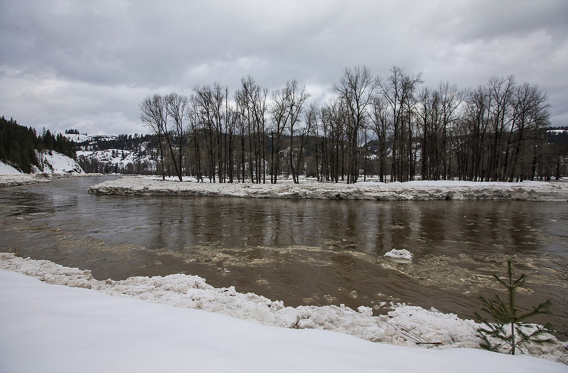 LOREN BENOIT/Press
Ice chunks float down the St. Joe River near Calder Friday morning.