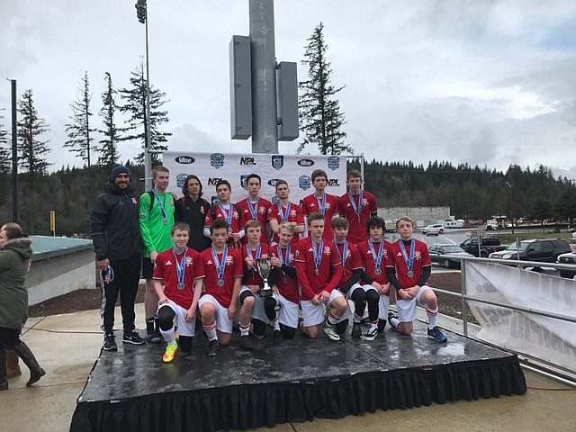 Courtesy photo
The Coeur d'Alene Sting Timbers FC 01 boys won their Washington Cup division championship last weekend over in Ravensdale, Wash. The Sting Timbers defeated Fuerza FC Academy 3-0 Sunday in the championship game. Goals were scored by Greyden Lee (2) and Cameron Dance, with assists by McKie Gregory and Greyden Lee. The Sting Timbers beat RSA Elite 01B 5-1 in the semifinals, with goals scored by Greyden Lee (3) Cameron Dance and Ty Shaw. In the front row from left are Carson Jacobsen, Jared Hoffman, McKie, Gregory, Gunnar Nickerson, Drew Helsper, Cameron Calabretto, Cadin Perry and Cameron Dance; and back row from left, coach Vito Higgins, Aidan Hassell, Chase Norris, Dylan Bengston, Ty Shaw, Greyden Lee, Kyler Sorensen and Reilly Burton.