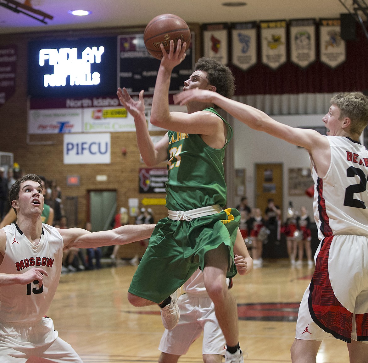 LISA JAMES/PressDylan Knight shoots as Moscow defenders rush in during the end of their 4A Region 1 championship game at NIC on Thursday night. Lakeland lost to Moscow, 44-45.