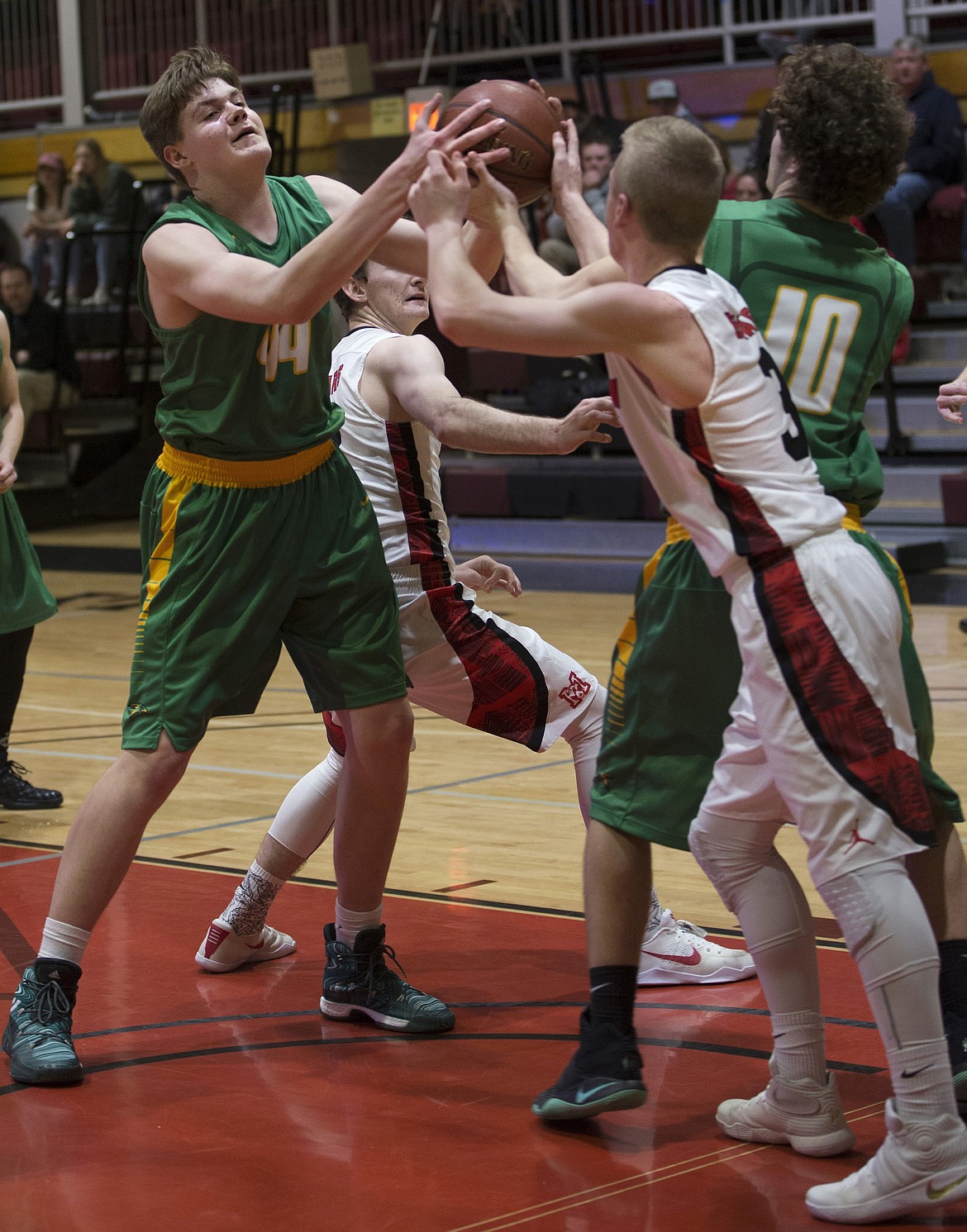 LISA JAMES/PressJosiah Haaland of Lakeland tries to keep Cooper Stephens of Moscow from stealing the ball during their 4A Region 1 championship game at NIC on Thursday night.