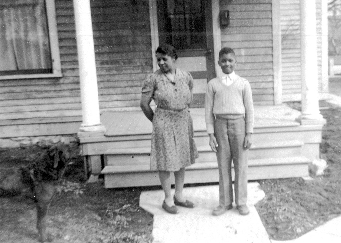 ARTIE THOMPSON poses with son Sylvester Douglas when he was about 10 years old. Artie worked as a housekeeper for many years for the John Sherman family in Kalispell, and was an active member of Epworth Methodist Church.