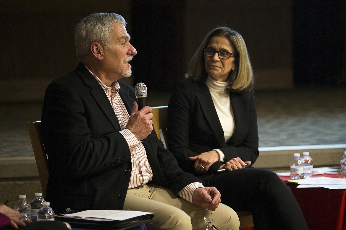 Former Idaho state Sen. John Goedde answers questions as moderator Wanda Quinn sits by at the Coeur d&#146;Alene Education Partnership annual presentation at the Coeur d&#146;Alene library Wednesday night.