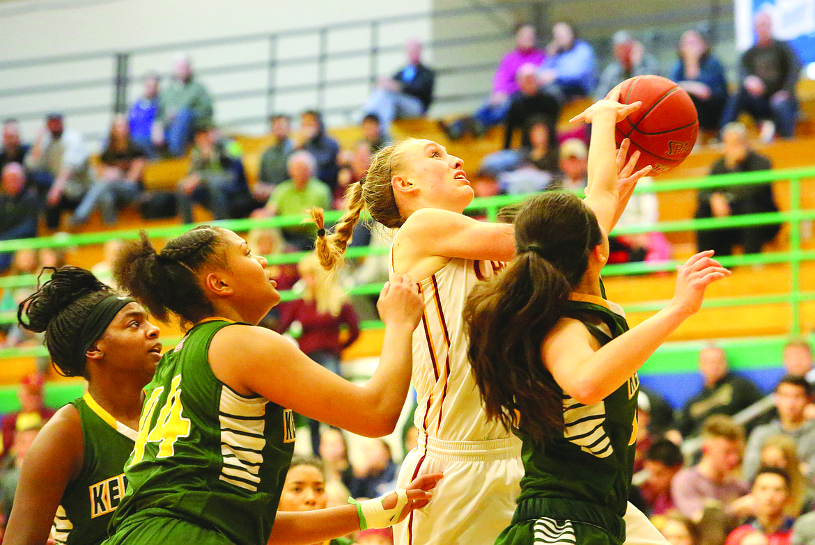 Connor Vanderweyst/Columbia Basin Herald
Moses Lake's Abby Rathbun drives to the basket against Kentridge.