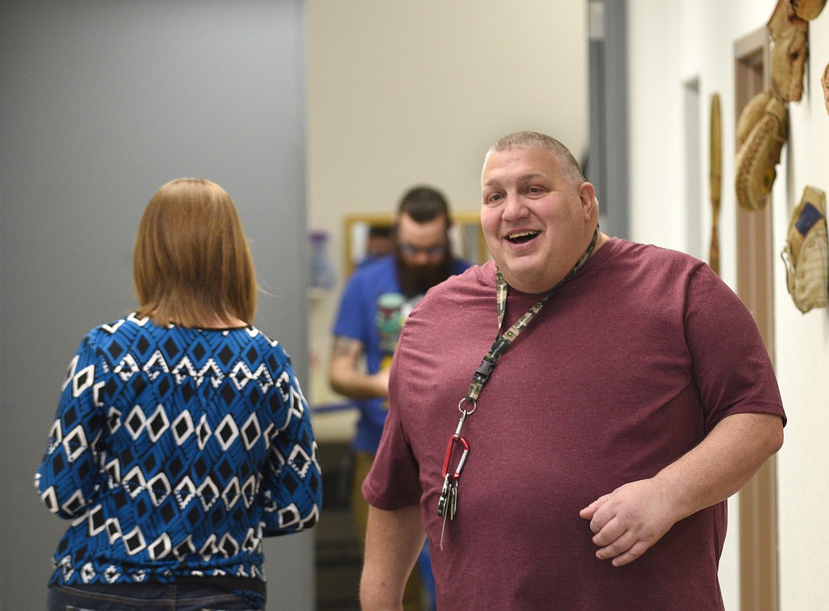 Jimmy Melick smiles as he works after talking with his coach, Lauren Straub, at Replay Sports. (Aaric Bryan/Flathead Journal)