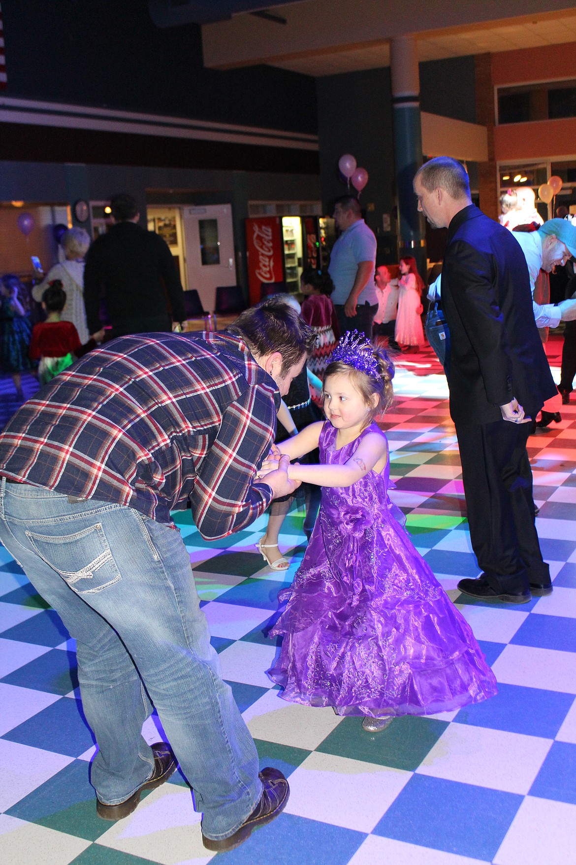 Cheryl Schweizer/Columbia Basin Herald
Girls got out their sparkliest, fanciest dresses to go dancing with Dad at the Father-Daughter dance Saturday night.