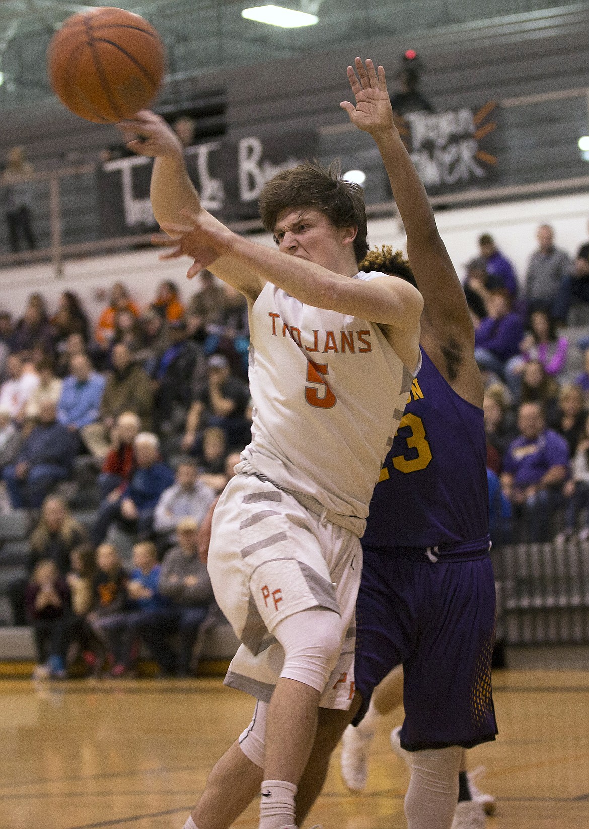 LISA JAMES/ PressTanner McCliment-Call of Post Falls passes during their State 5A Region 1 championship game against Lewiston at Post Falls High School on Tuesday night. Post Falls lost to Lewiston, 48-51.