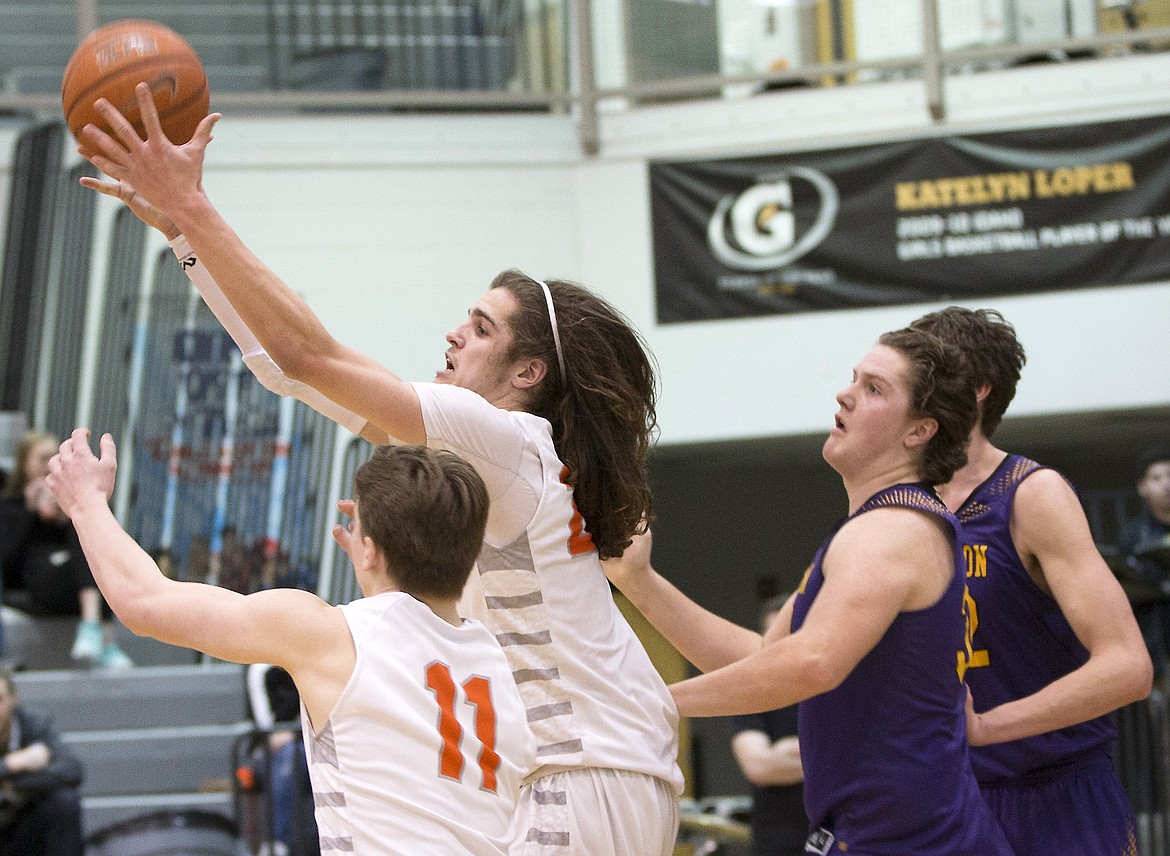 LISA JAMES/ PressJake Pfennigs of Post Falls catches a pass during their State 5A Region 1 championship game at Post Falls High School on Tuesday night. Post Falls lost to Lewiston, 48-51.