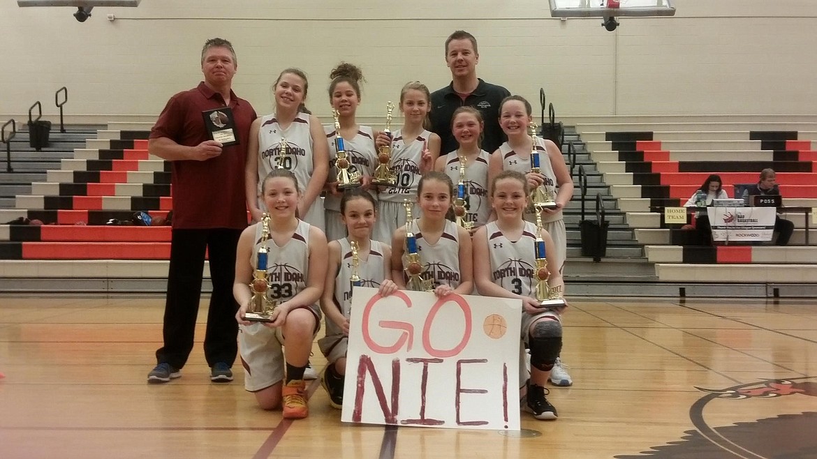 Courtesy photo
The North Idaho Elite fifth-grade girls basketball won the championship of the Spokane AAU League finishing with an 11-0 record. The Elite will put its 19-game win streak on the line March 17-18 when they will face some of the best competition in the Northwest at the Washington state junior high championships in Spokane. In the front row from left are Payton Sterling, Sam Beamis, Lauren Bengtson and Taylor Hill; and back row from left, head coach Terry Zufelt, Kamryn Curry, Kurtsten McKellips, Avery Waddington, Sophia Zufelt, Kamryn Pickford and assistant coach Kevin Pickford.