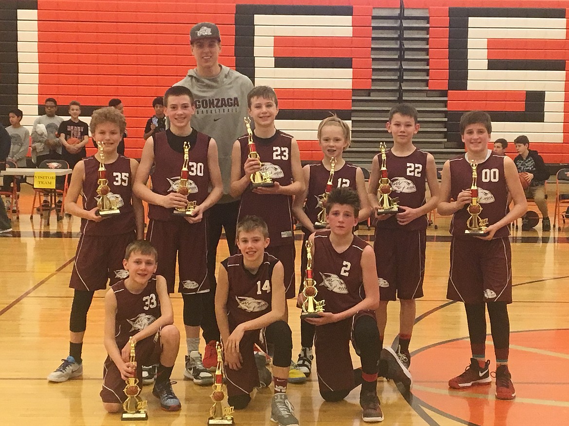 Courtesy photo
The Piranhas took second place in the sixth-grade boys Spokane AAU league basketball championship game on Sunday. In the front row from left are Reed Whatcott, Kolton Mitchell and Riply Luna; and back row from left, Deacon Kiesbuy, Zach Johnson, Varick Meredith, Brodie Beebe, Jacob Thompson and Kolby Luna. Gonzaga basketball player Zach Collins, rear, was on hand to present the team with trophies. Not pictured is coach Kelly Reed.