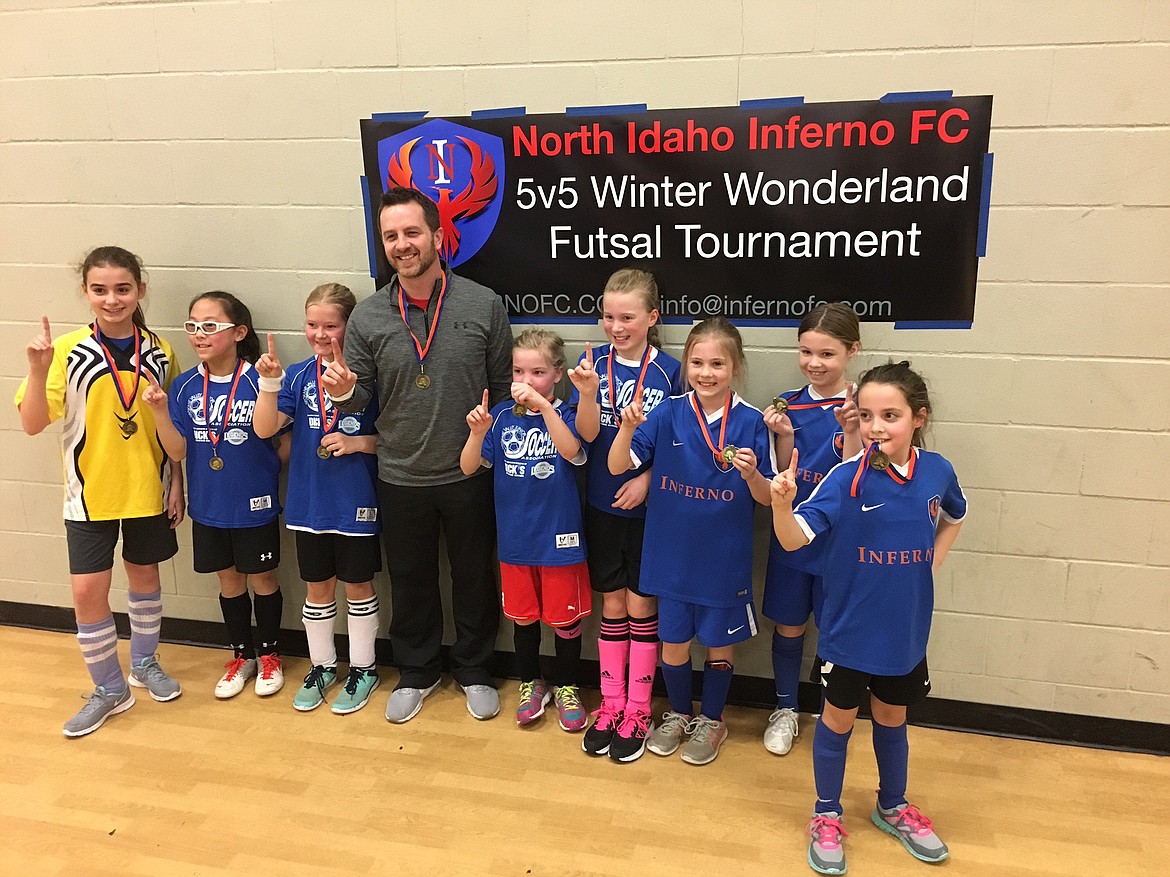 Courtesy photo
The Team Ballers under-10 girls took first place at the North Idaho Inferno FC 5 v 5 Winter Wonderland futsal tournament. The Ballers went 4-1 in the coed bracket. Pictured from left are Abby Leitner, Vivian Tran, Kai Coursey, coach Jeremy Van Lith, Emmy Van Lith, Hayleigh Cromwell, Kylie Johnson, Elena Nilson and Charlie Calkins.