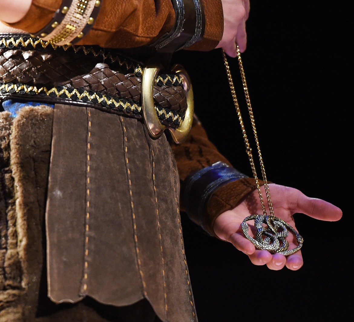 CAMREN ROSS, as Cairon, a centaur, presents the AURYN to Atreyu in a dress rehearsal for &#147;The Neverending Story,&#148; Tuesday, Feb. 21, at the O&#146;Shaughnessy Center. (Brenda Ahearn/This Week in the Flathead)