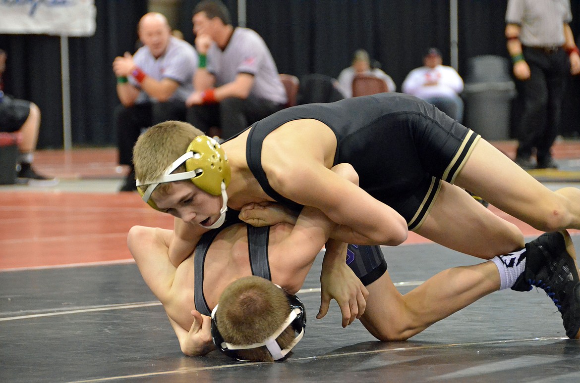 Photo by Amy Stepro
Taylor Bush drives his opponent's head into the mat.