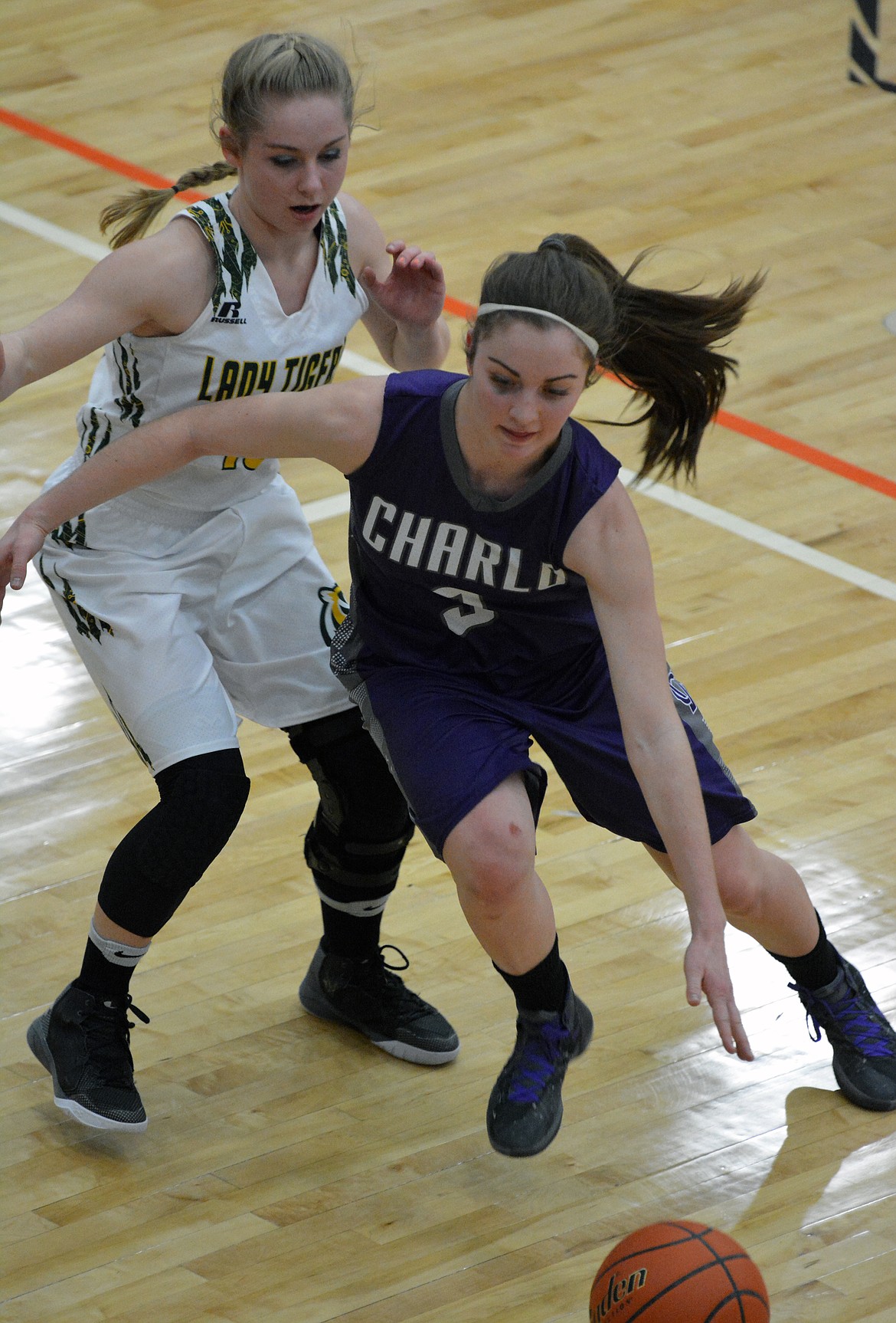 CHARLO HIGH School guard Cheyenne Nagy drives to the basket in the first half of the Western Class 14C Challenge Game against St. Regis Monday night at the Ronan Events Center. The Lady Vikes finished third District play. (Jason Blasco/Lake County Leader)