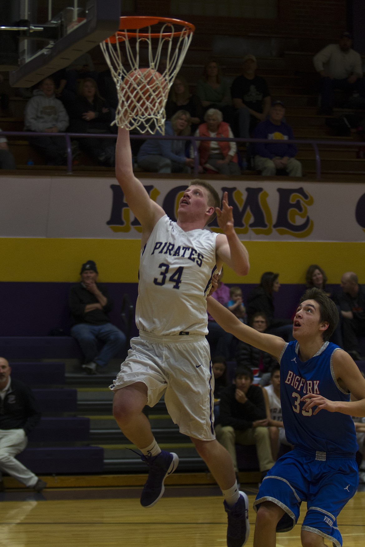 POLSON POWER Forward Matthew Rensvold goes up for an easy transition basket in the Feb. 9 contest against Bigfork at Linderman Elementary School. Rensvold, one of the Pirates&#146; leading scorers, should be a key factor, according to Pirates&#146; Coach Randy Kelley in their first round Class A Divisionals at 6 p.m. Wednesday against Corvallis at Hamilton High School. (Jeremy Weber/Lake County Leader)