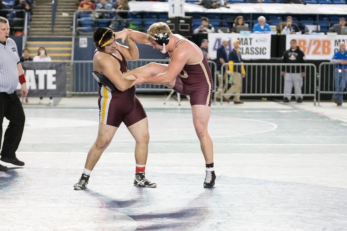 Kennady Schlagel/courtesy photo
Moses Lake heavyweight Daniel Zermeno grabs a hold of a leg during his match.