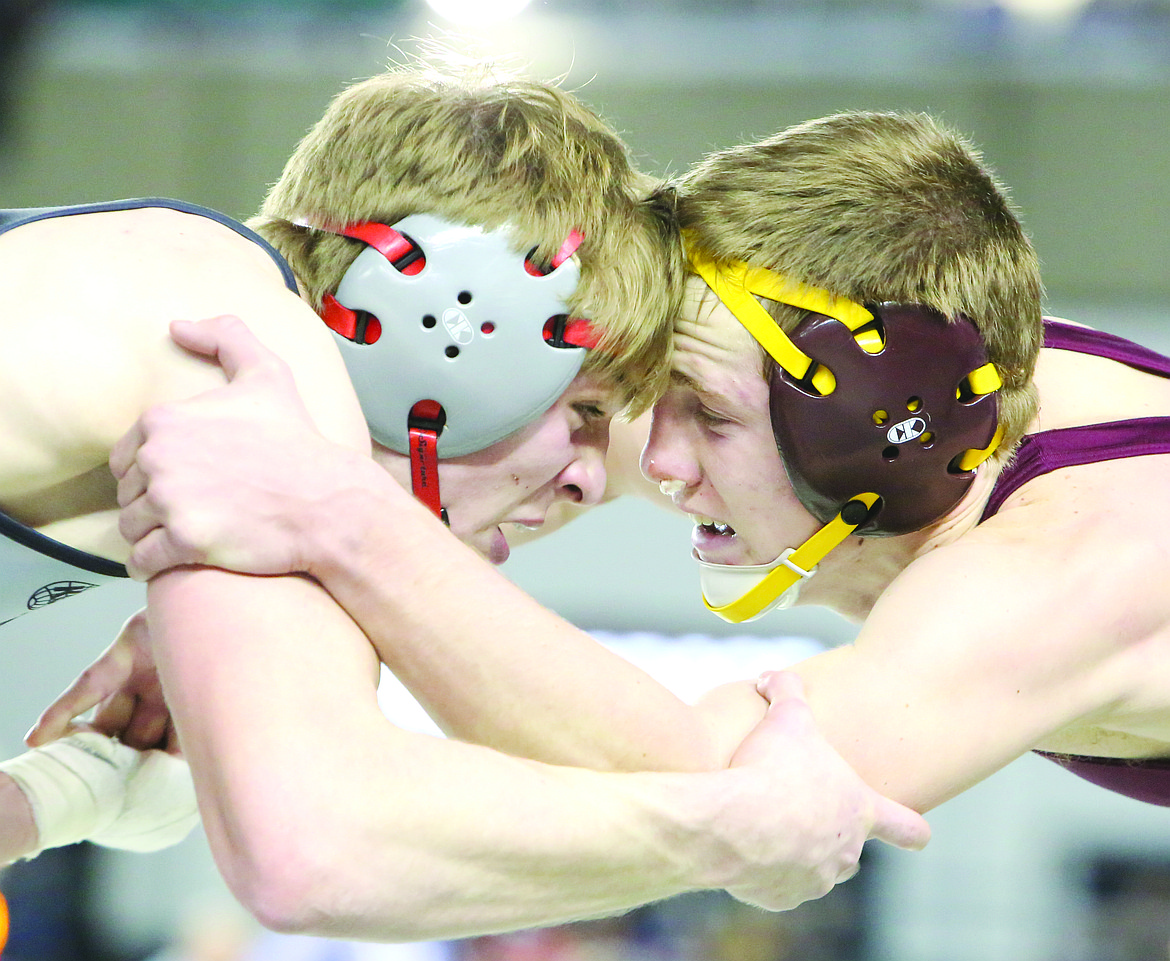 Connor Vanderweyst/Columbia Basin Herald
Moses Lake&#146;s Hunter Cruz ties up with Union&#146;s Tommy Strassenberg.