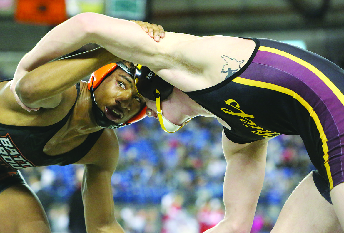 Connor Vanderweyst/Columbia Basin Herald
Battle Ground&#146;s Izaiah Duran grapples with Moses Lake&#146;s Hunter Cruz.