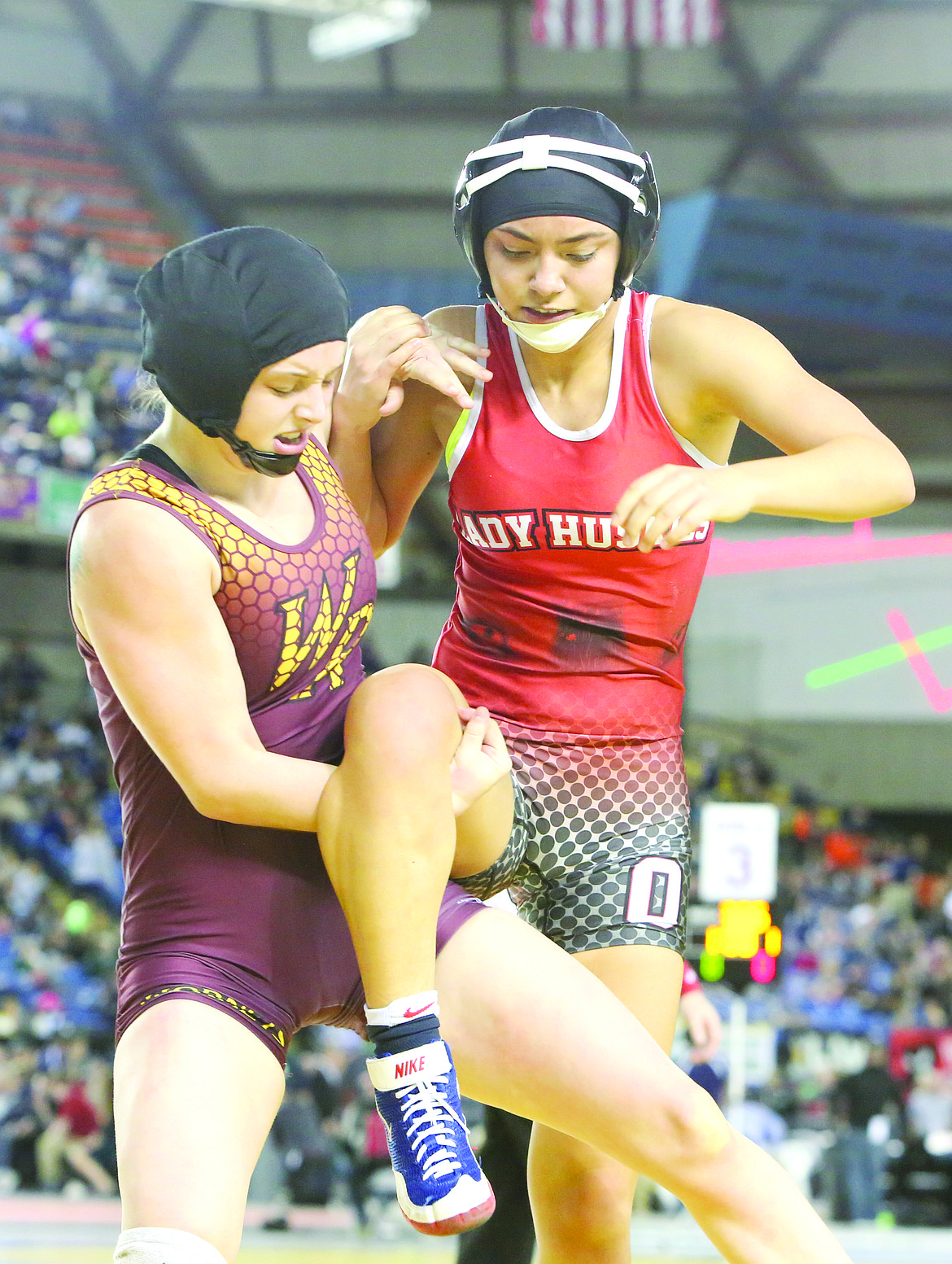 Connor Vanderweyst/Columbia Basin Herald
Othello&#146;s Nikki Velazquez wrestles White River&#146;s Erin Redford in the 130-pound finals.