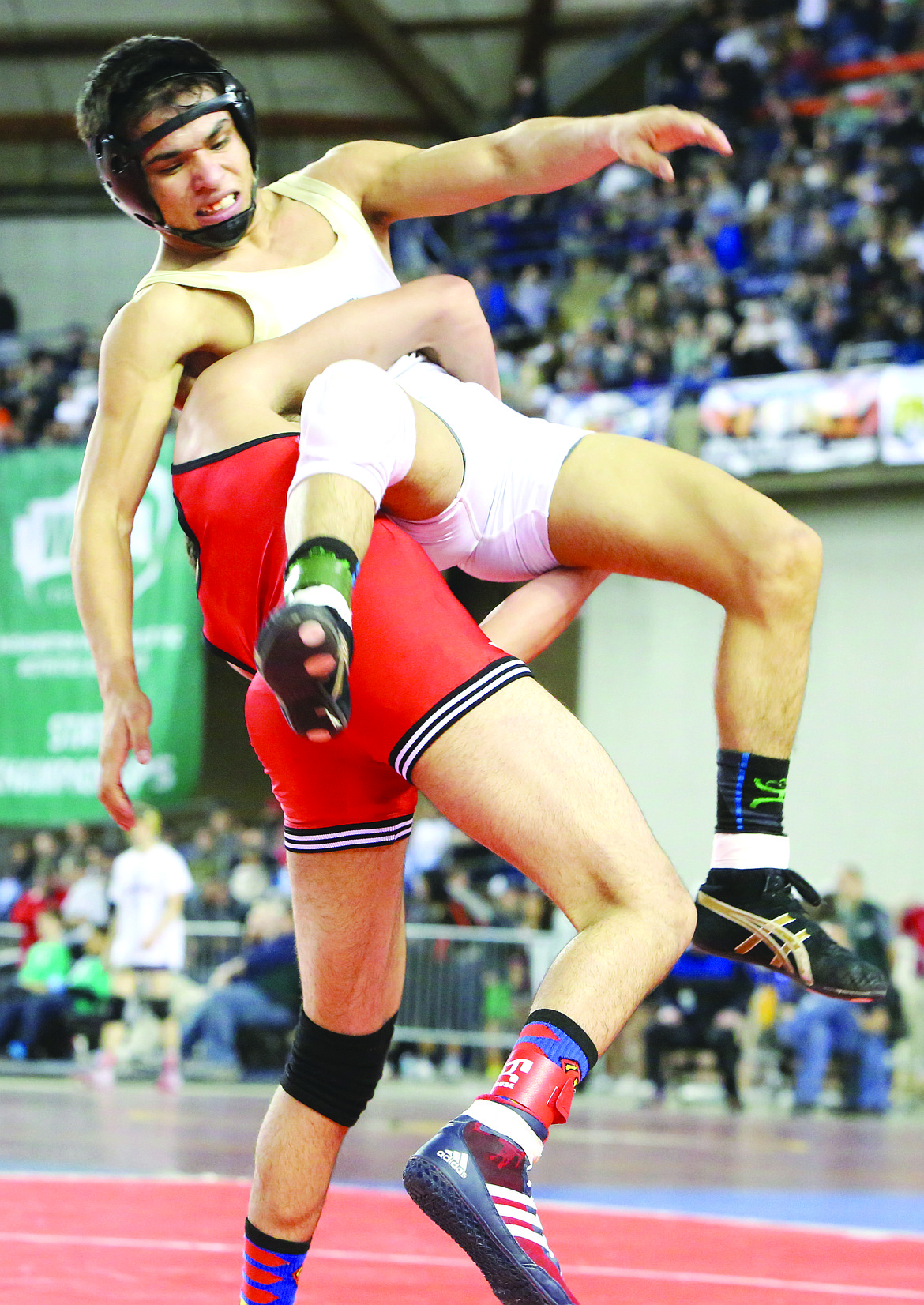 Connor Vanderweyst/Columbia Basin Herald
Royal&#146;s Abraham Medina is thrown to the ground in the 126-pound finals.