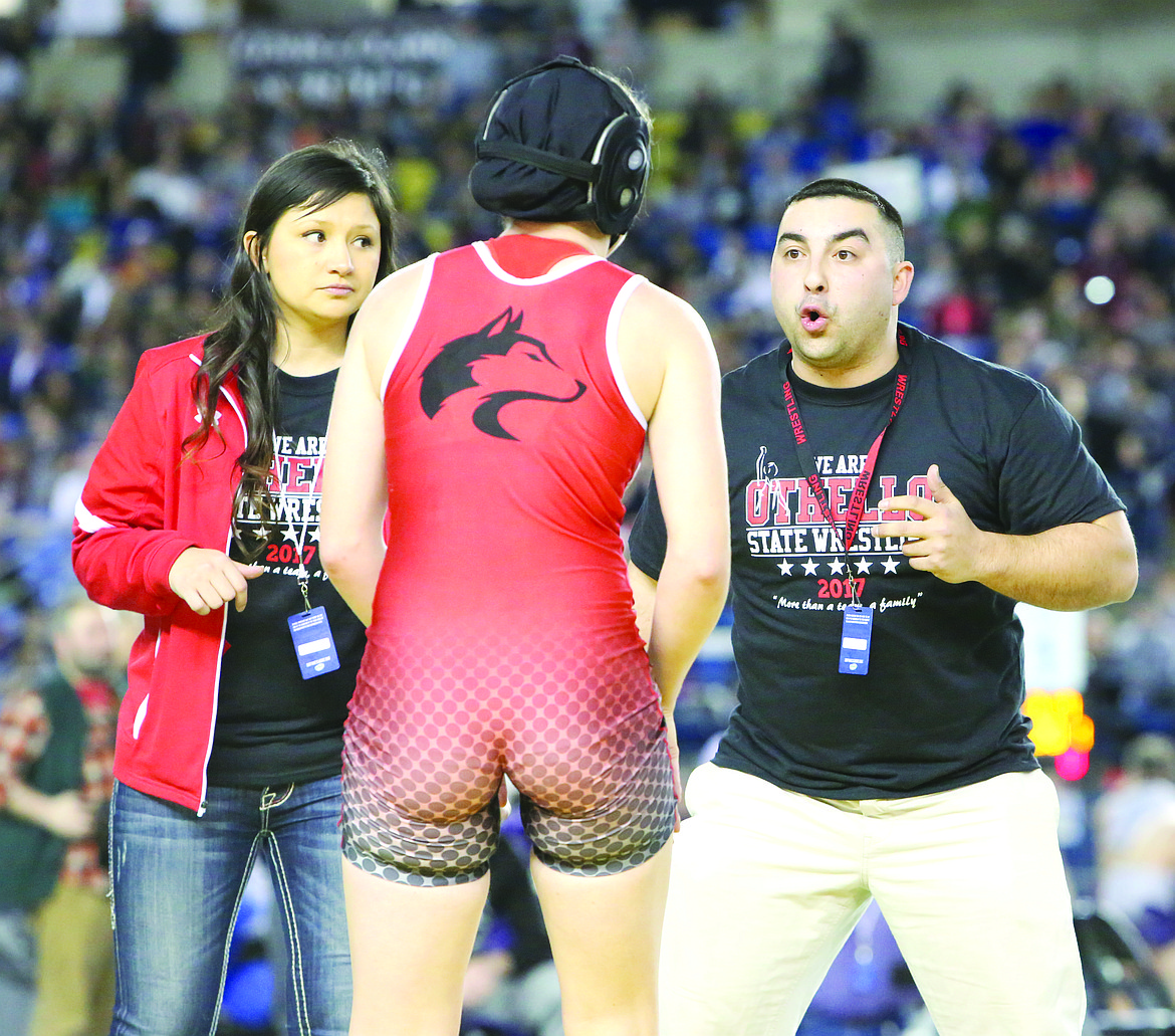 Connor Vanderweyst/Columbia Basin Herald
Othello head girls wrestling coach J.J. Martinez gives instruction.