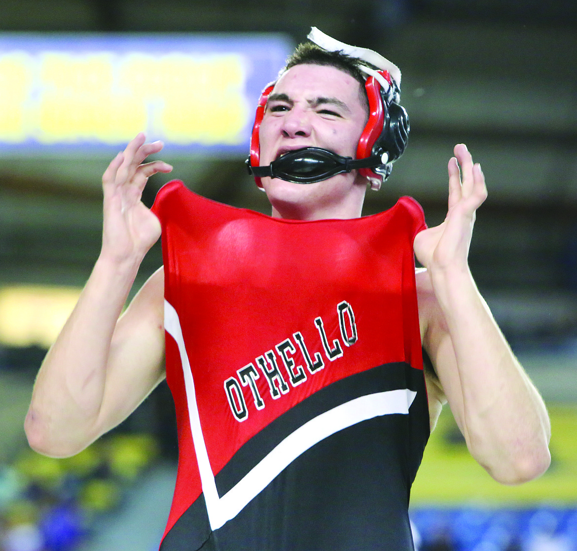 Connor Vanderweyst/Columbia Basin Herald
T.J. Martinez shows off his Othello pride after winning the 195-pound state championship 3-2.