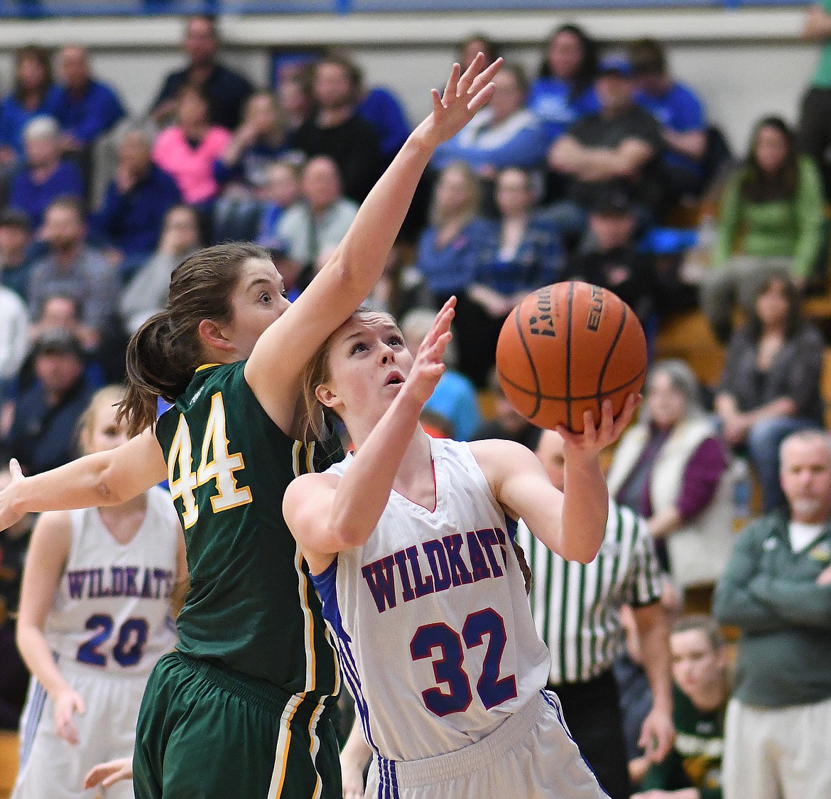 Kiara Burlage with a layup despite the foul.