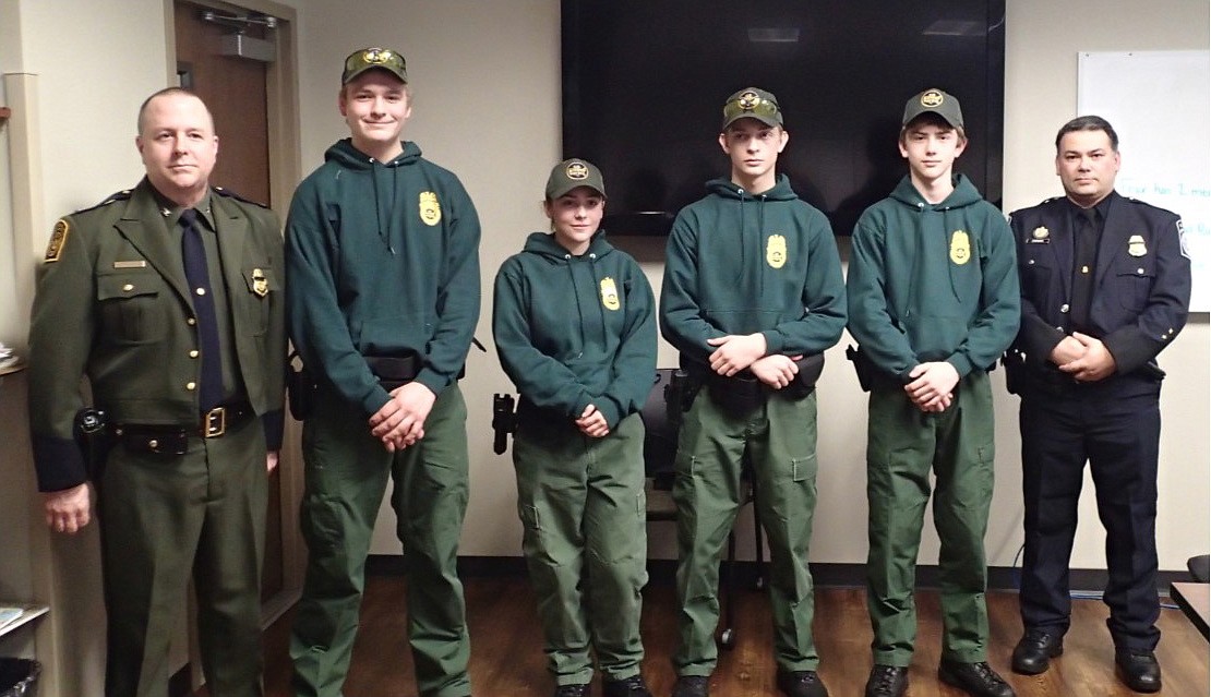 &#151;Courtesy photo
Bonners Ferry Border Patrol Explorers No. 190 cadets graduate on Feb 4. From left PAIC Turner, Christian Nevarro, Dina Cook, Dawson Thomas, Ian Wallace, and OFO Eastport Officer Carmen.