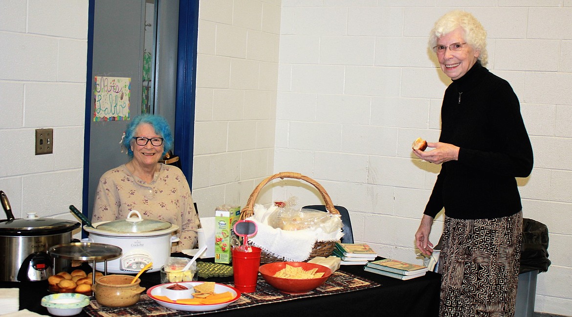 Mineral County’s RSVP program members Neva Cummings and Hyrel Walsh serve up chili and chicken vegetable soup and rolls during Saturday’s Senior Health Fair in Superior. (Kathleen Woodford/Mineral Independent).