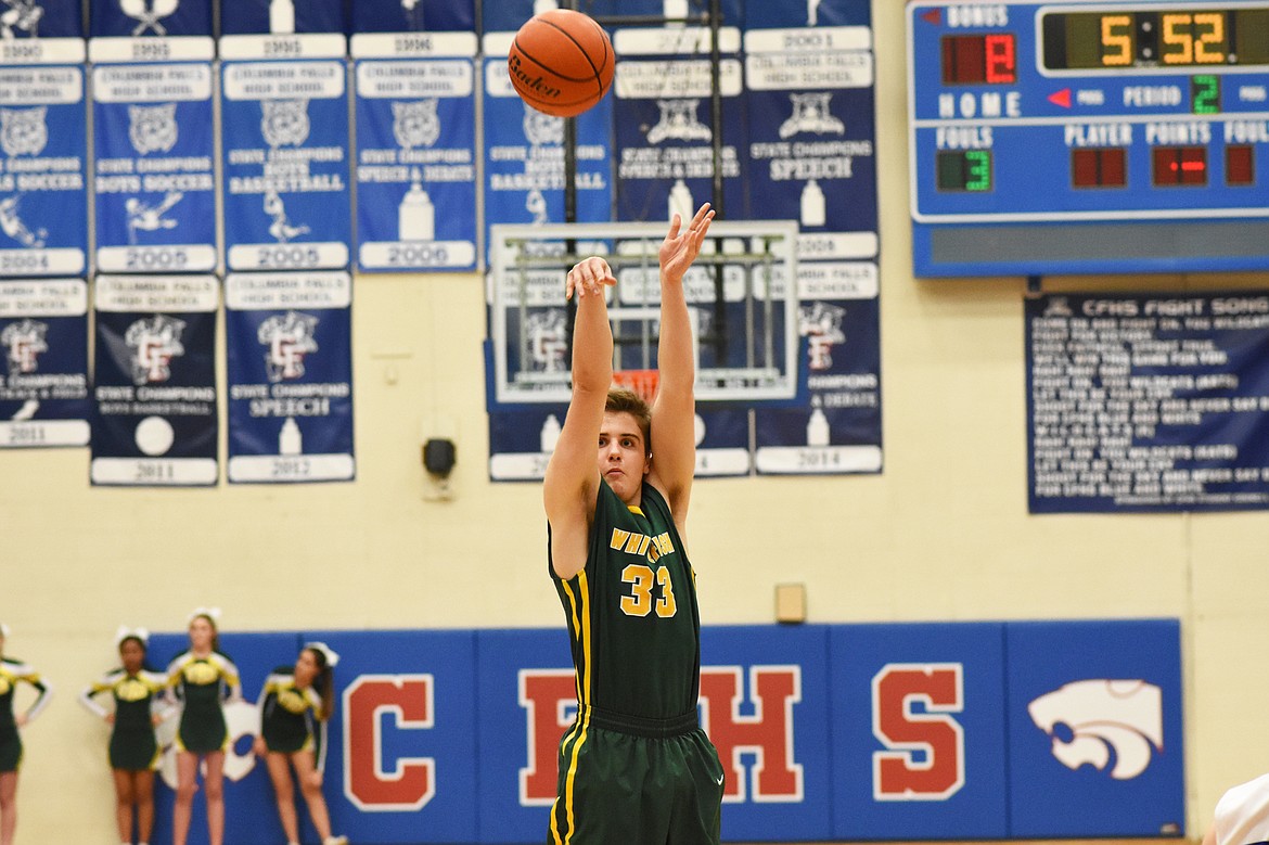 Ryan Kemm launches a three in the second quarter of Thursday's win over Columbia Falls.