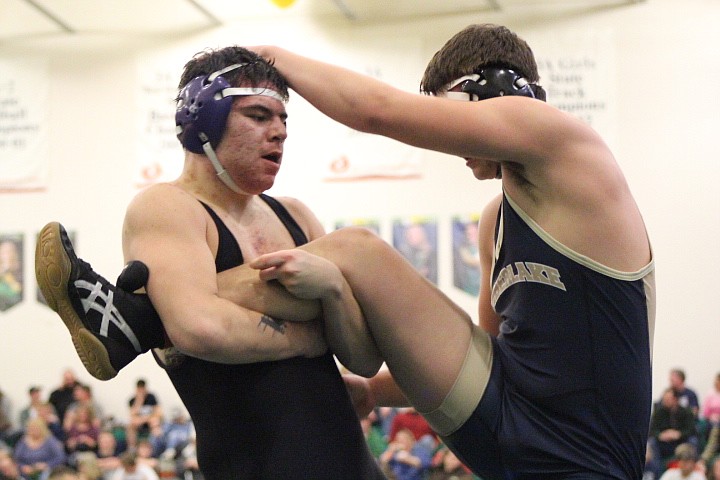 Photo by Stephanie Ivie 
Austin Serrano controls his opponent&#146;s leg at Lakeland High School.