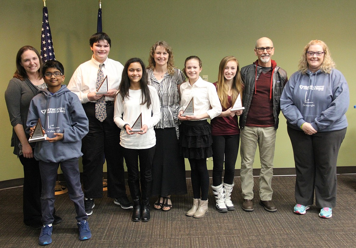 Camille Neuder, pictured third from right, finished fourth in the recent North Idaho Chapter of Math Counts competition hosted by Idaho Society of Professional Engineers and North Idaho College. Sandpoint Middle School math teacher Patrick Lynch is pictured second from right.
(Photo courtesy NORTH IDAHO COLLEGE)