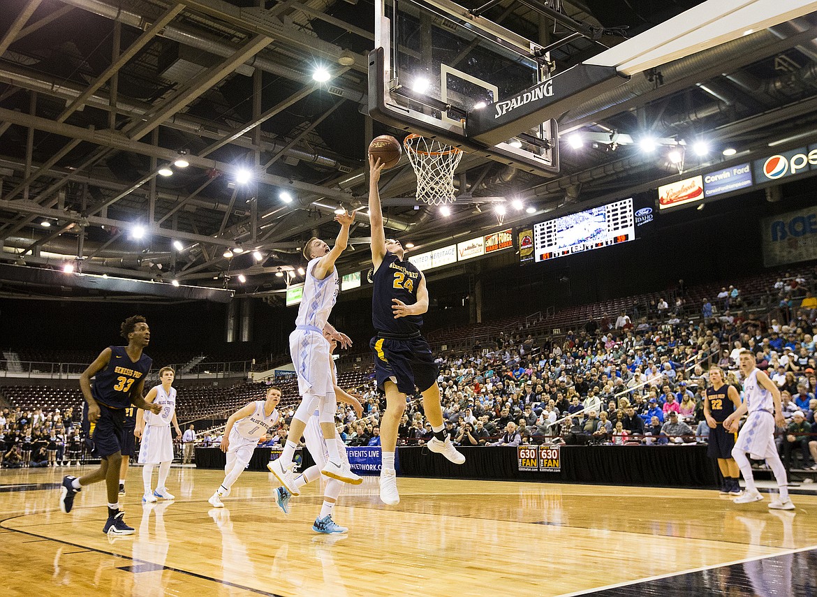 LOREN BENOIT/PressJonny Hillman (24), of Genesis Prep scores a breakaway layup against Dietrich in the 1A DII championship game.