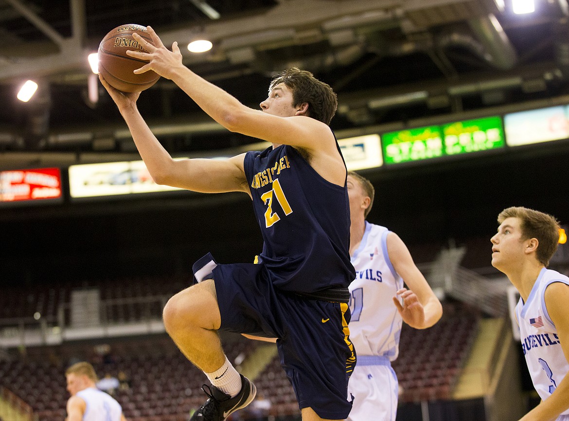 LOREN BENOIT/Press

Junior Williams, of Genesis Prep, goes for a layup during Saturday&#146;s 1A DII championship game against Dietrich at the Ford Idaho Center in Nampa.