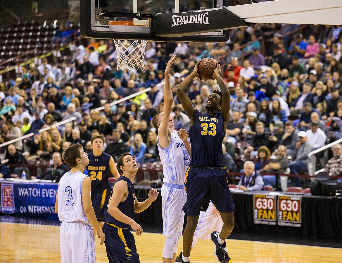 LOREN BENOIT/PressGenesis Prep senior Stephane Manzi shoots a layup in the first half of the 1A DII championship game against Dietrich.