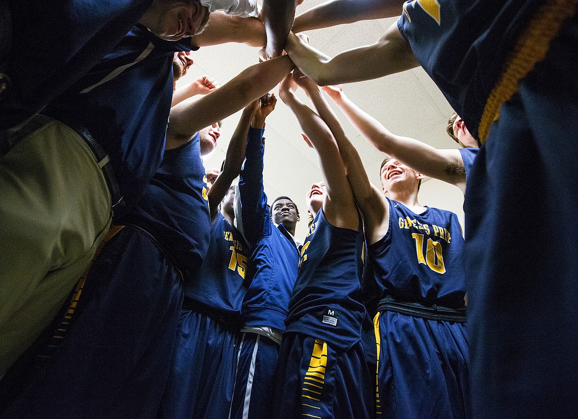 LOREN BENOIT/PressGenesis Prep players gather in the locker room after defeating Dietrich for the 1A DII championship Saturday morning at the Ford Idaho Center in Nampa.