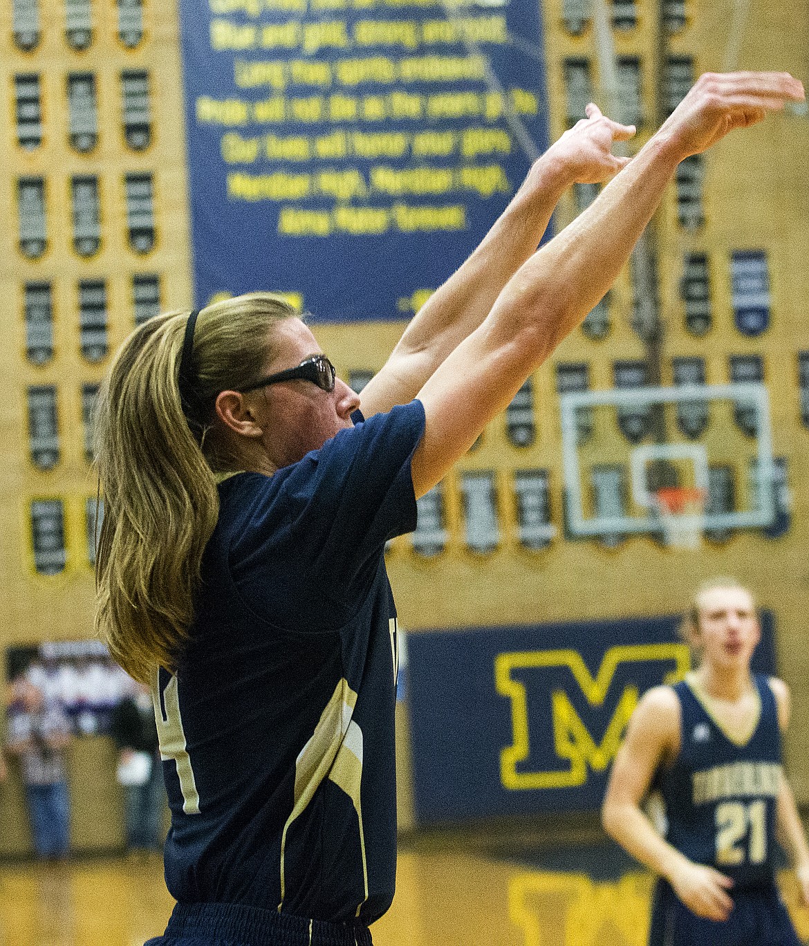 LOREN BENOIT/PressDave Dickinson shoots a three pointer against Sugar-Salem in game 1 of the state 3A boys basketball tournament last Thursday at Middleton High School.