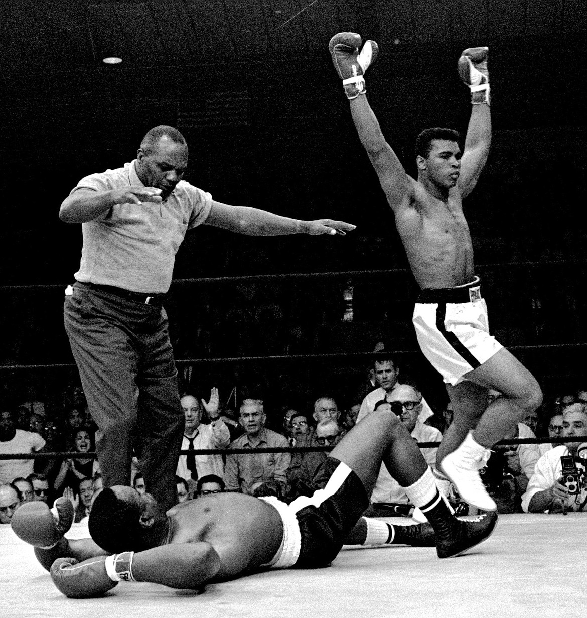 AP PHOTO BY JOHN ROONEY
Referee Jersey Joe Walcott counts out Sonny Liston in Round One at Madison Square Garden in title fight rematch against Muhammad Ali in Lewiston, Maine on May 25, 1965.