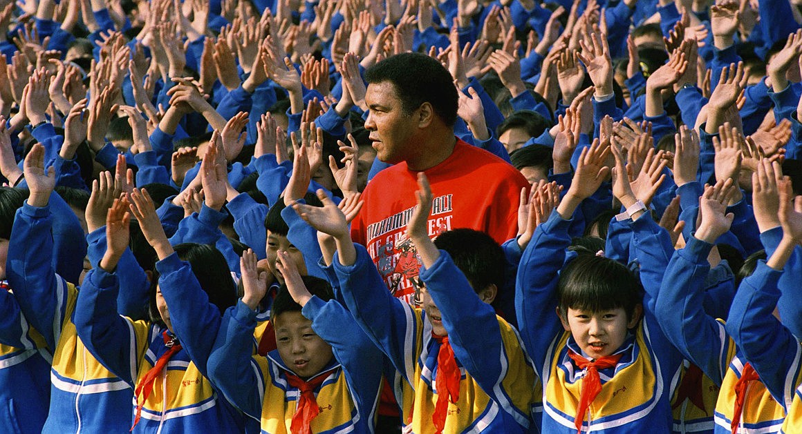 AP PHOTO
Muhammad Ali surrounded by Chinese school children during visit to Beijing No. 1 Experimental Primary School, China (1993).