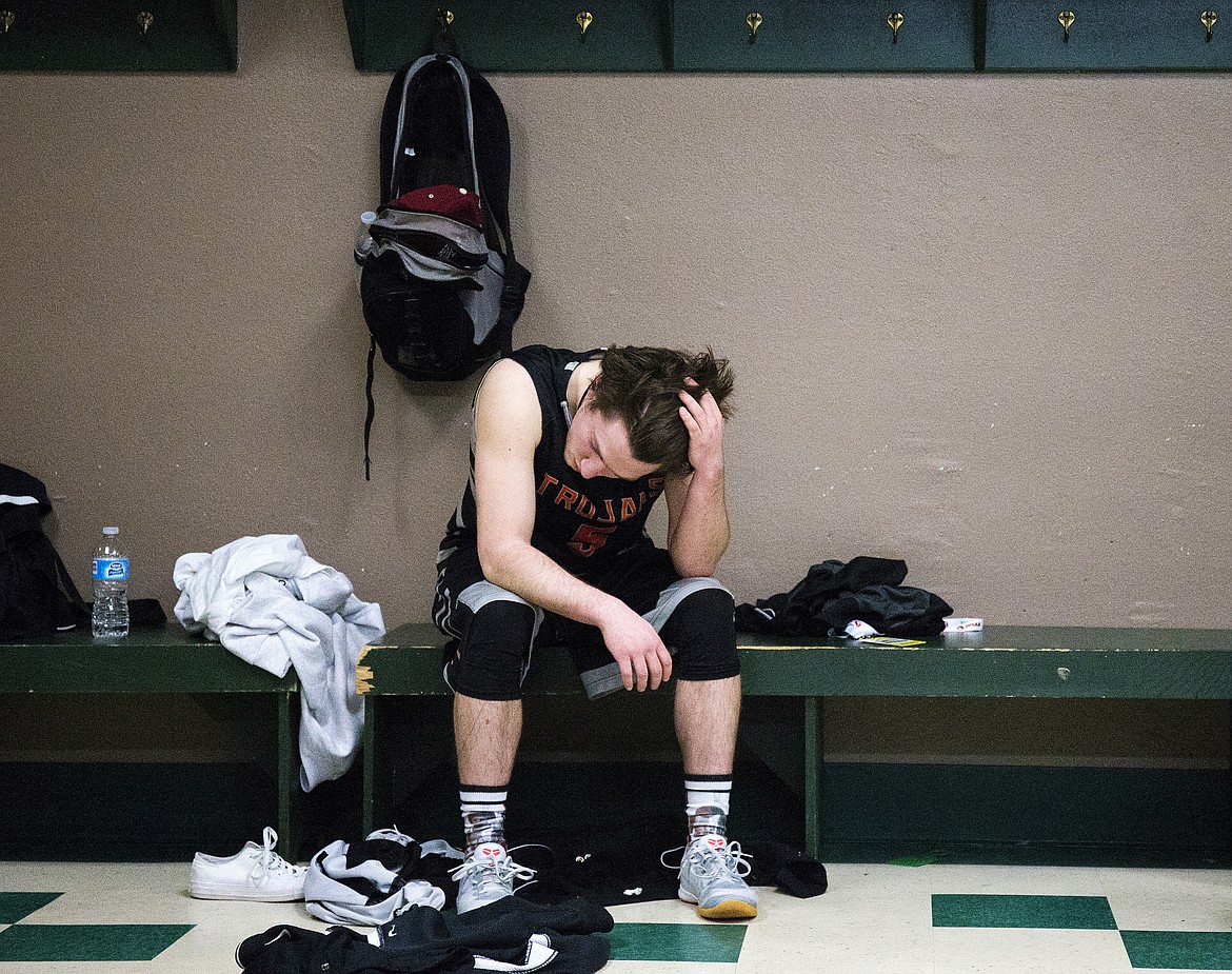 LOREN BENOIT/PressPost Falls senior Cameron McKeown reflects after losing 72-61against Centennial High School in the 5A state tournament semifinal game Friday night at the Ford Idaho Center in Nampa.