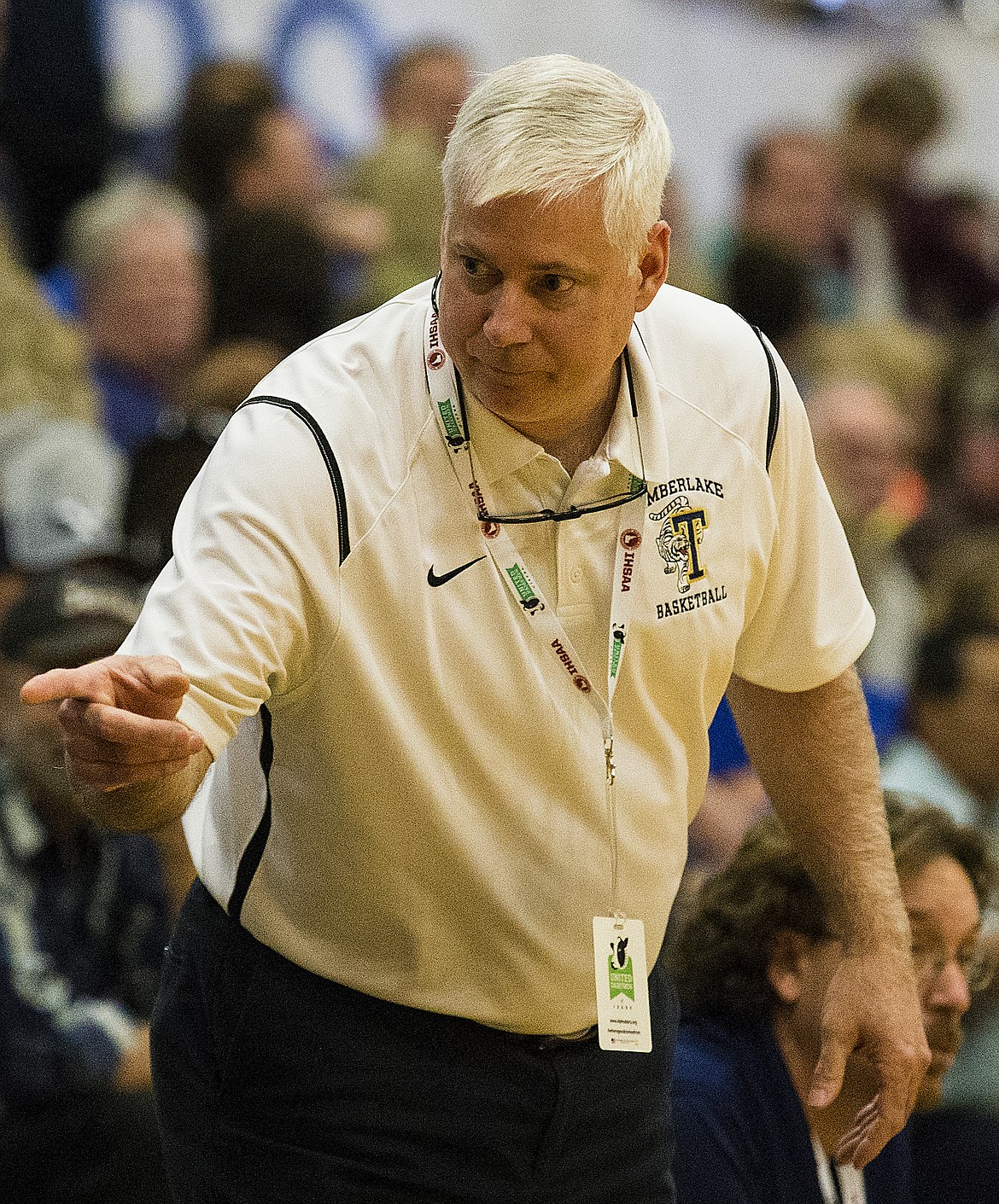 LOREN BENOIT/PressHead Coach Michael Scott points to one of his bench players during game 1 of the state 3A boys basketball tournament Thursday at Meridian High School.