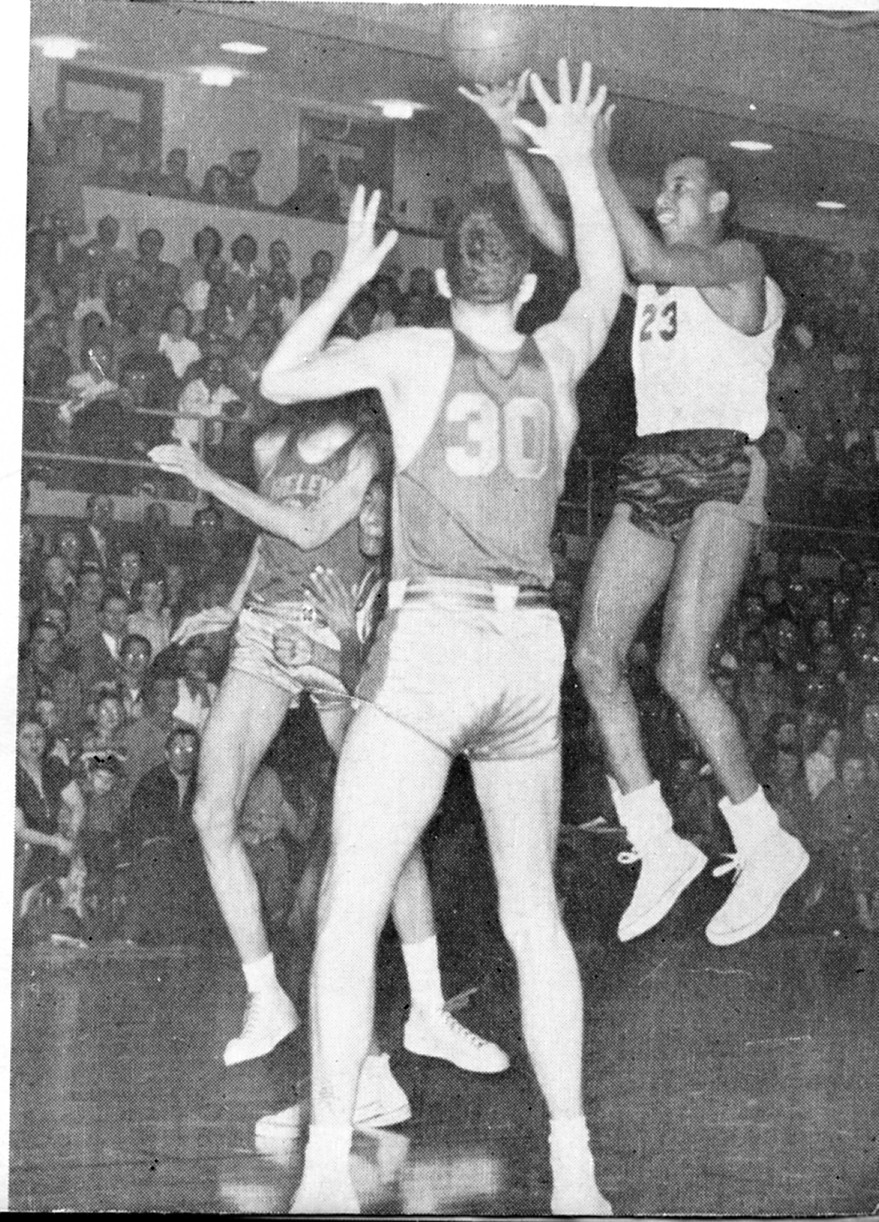 Zip Rhoades (23)  takes a shot in the game against Helena that was the &#147;coming-out&#148; party for the big guard from Baltimore. Rhoades led the Braves to hand Helena their only defeat of the season. The photo is featured in the 1953 Flathead County High School annual.  (Courtesy Jerry Siderius)