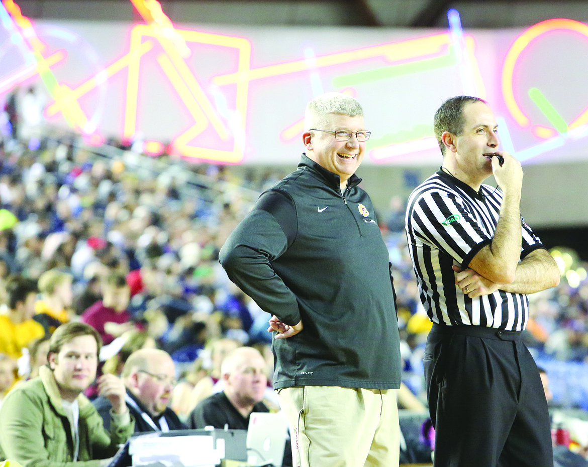 Connor Vanderweyst/Columbia Basin Herald
Moses Lake head coach Matt Strophy smiles on the sideline during the state tournament.