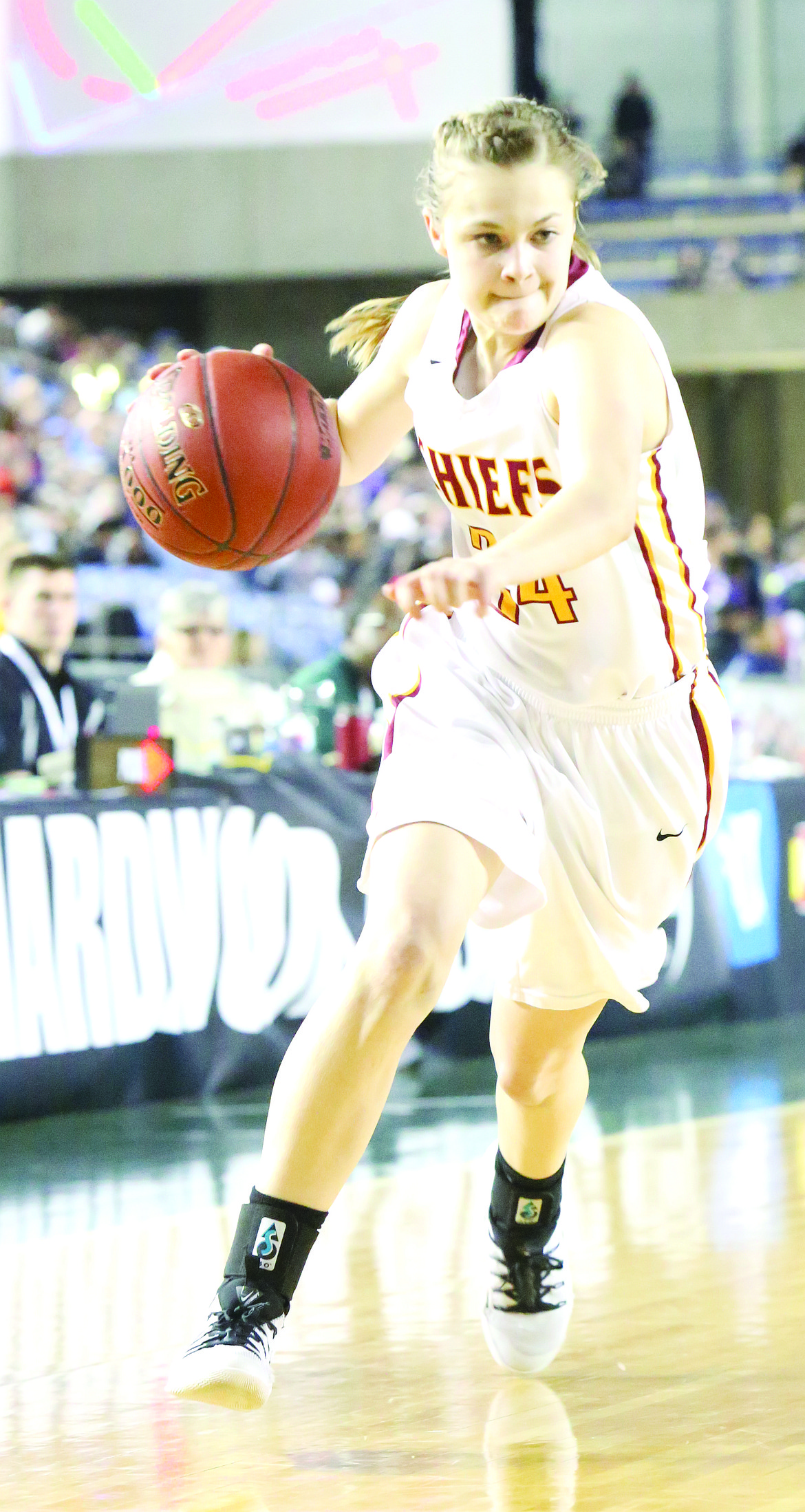 Connor Vanderweyst/Columbia Basin Herald
Taylor Stevens drives to the basket during the state tournament.