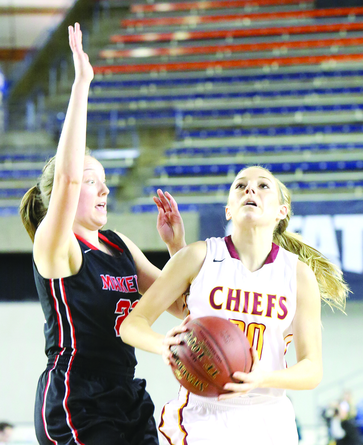 Connor Vanderweyst/Columbia Basin Herald
Moses Lake's Jessica Olson (right) goes up for a shot against Camas.