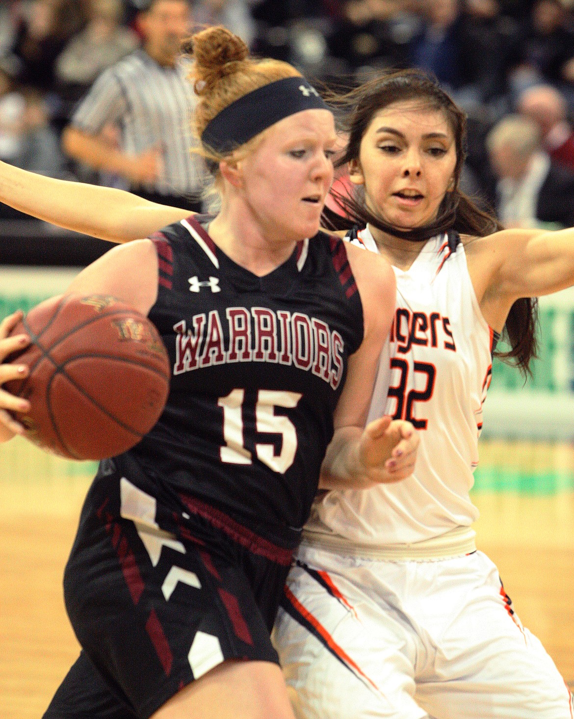 Rodney Harwood/Columbia Basin HeraldAlmira/Hartline-Coulee senior Berlyn Hunt (15) drives against Shania Graham of Republic during the second quarter of Saturday's 1B state championship game at the Spokane Veteran's Memorial Arena.