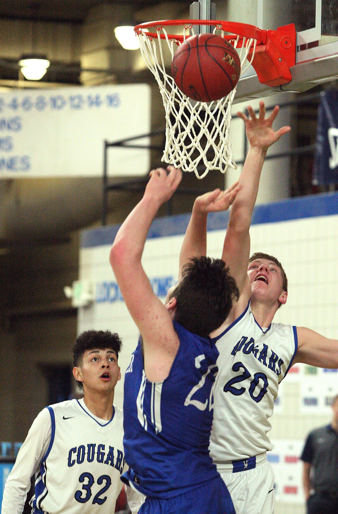 Rodney Harwood/Columbia Basin HeraldWarden senior Tanner Skone (20) goes up to block the shot of La Center's Matt Baher (22) during the third quarter of Friday's 1A Hardwood Classic consolation game in the Yakima SunDome.