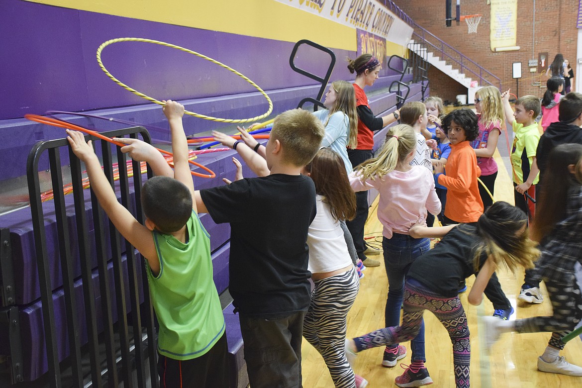 LINDERMAN ELEMENTARY School students scramble for equipment during the Jump Rope for Heart event March 1. (Brett Berntsen/Lake County Leader)