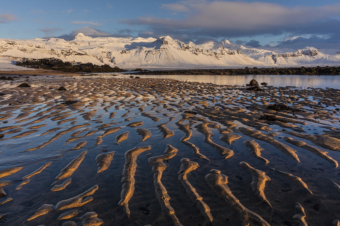 Snow capped mountain above the North Atlantic shoreline on the Snaefellsnes peninsula in western Iceland. (Chuck Haney photo)