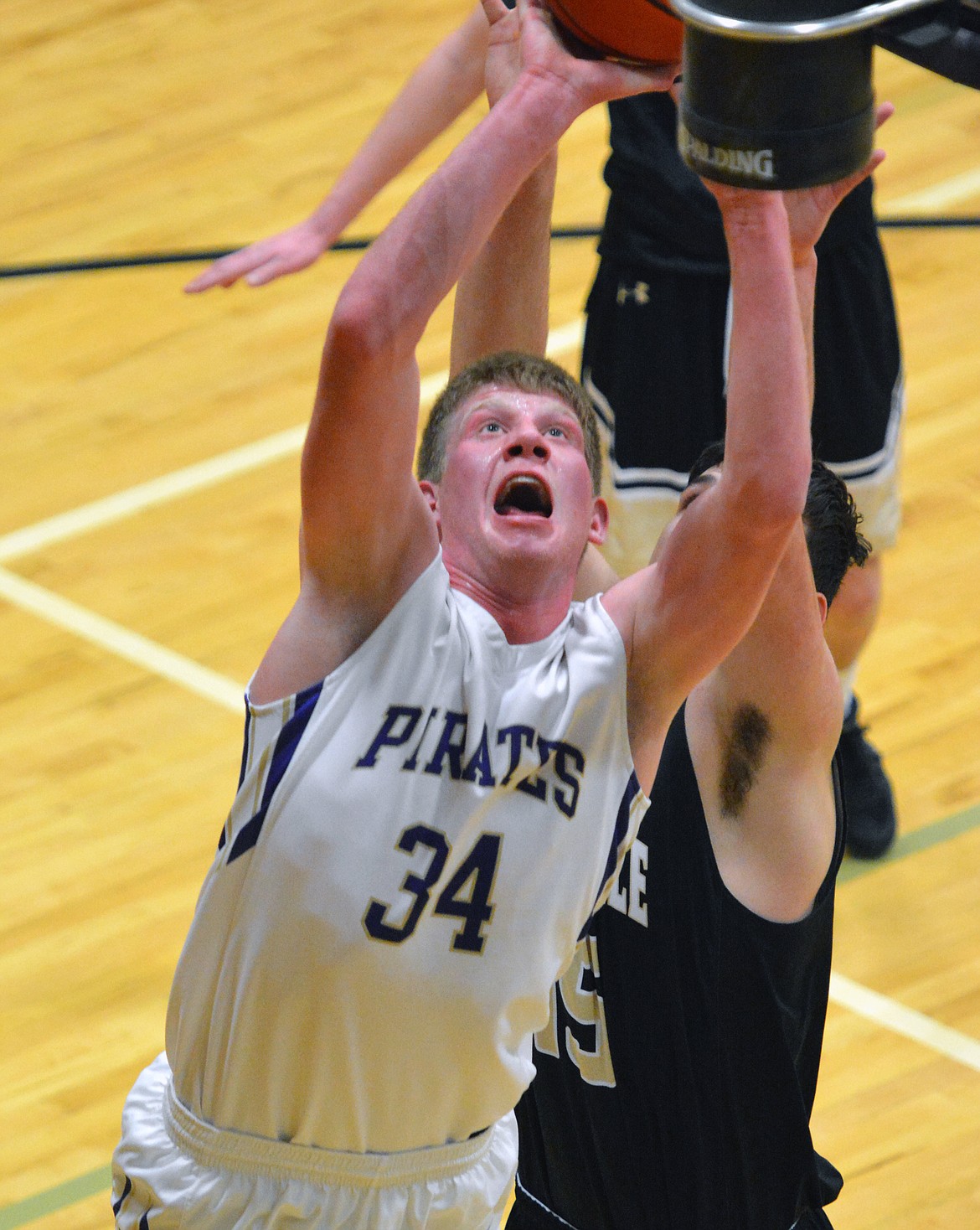 POLSON PIRATE Forward Matthew Rensvold will be one of the key contributors to the Pirates' run for a Montana Class-A state basketball title. Rensvold, a 6 foot, 4 inch post player, is also signed to play football for the University of Montana-Grizzles for the 2017-2018 season. (Jason Blasco/Lake County Leader)